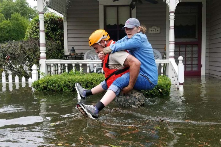 Texas-National-Guardsman-carries-a-resident-of-Houston-from-her-flooded-home